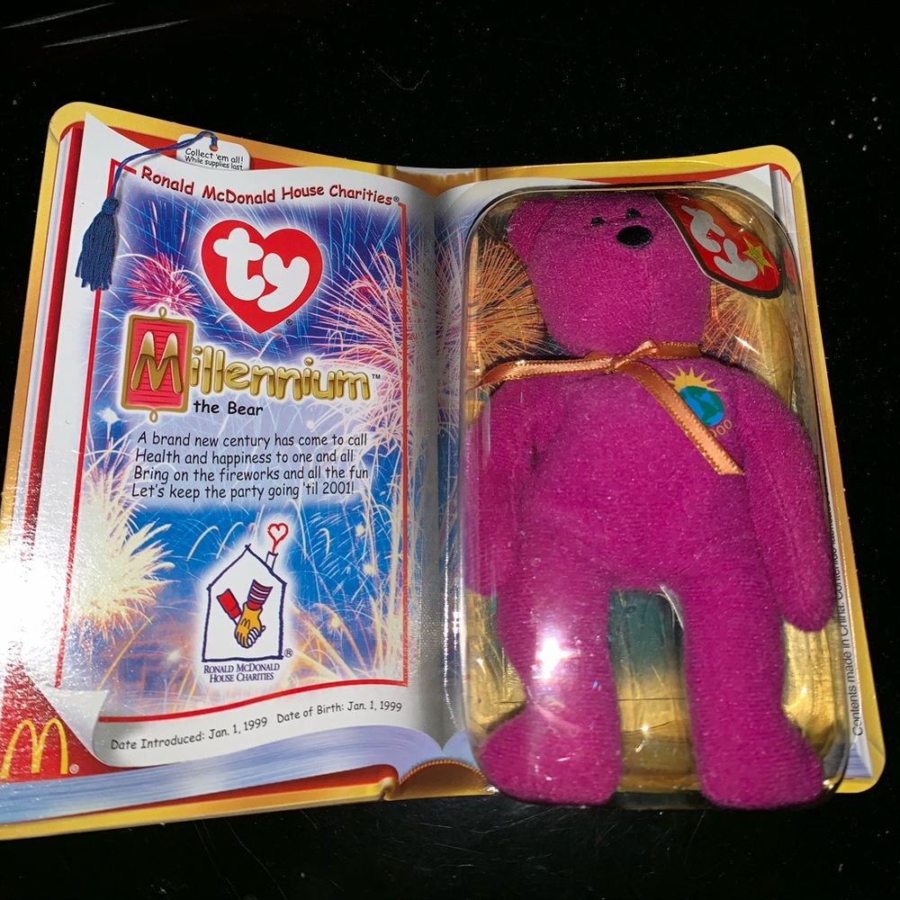 Millennium Ty Beanie Bear. Never been opened.